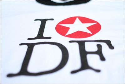 Close-up of ‘I [star] DF’ t-shirt.