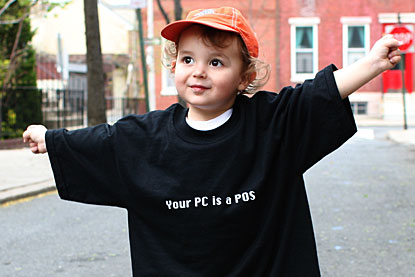 The boy wearing a ‘Your PC is a POS’ t-shirt
