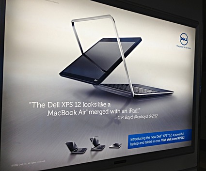 Photo of an airport terminal billboard from Dell for the XPS 12, a hybrid laptop/tablet. Ad slogan: “The Dell XPS 12 looks like a MacBook Air merged with an iPad.”