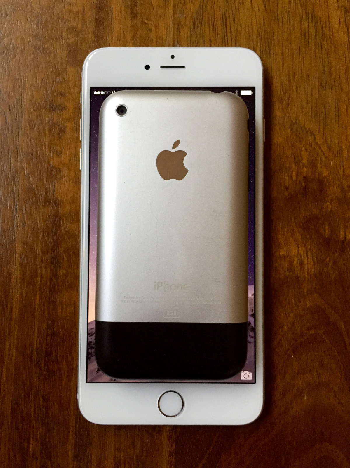 An original 2007 iPhone fits entirely within the display, just the display, of an iPhone 6 Plus.