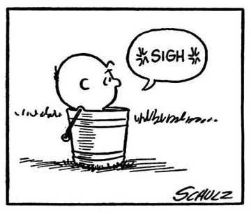 Charlie Brown, sighing, with the word ‘sigh’ surrounded by what look like asterisks.